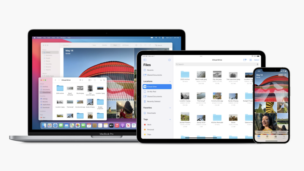 Ein Macbook Pro, ein iPad und ein iPhone zeigen Ordner und Bilder vom iCloud-Laufwerk an 