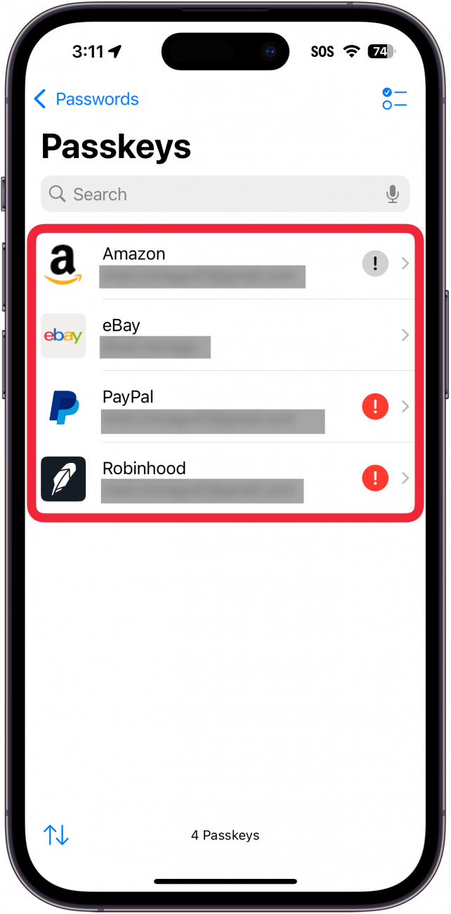 Passkey-Bildschirm der iPhone-Passwort-App mit einem roten Kästchen um eine Liste von Passkeys