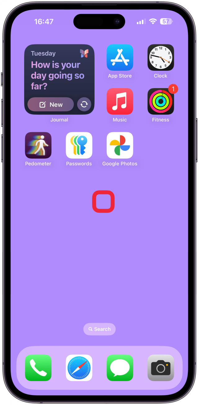 Drücken Sie einen leeren Speicherplatz auf Ihrem Startbildschirm an, bis Ihre Apps mit dem Wackeln beginnen.