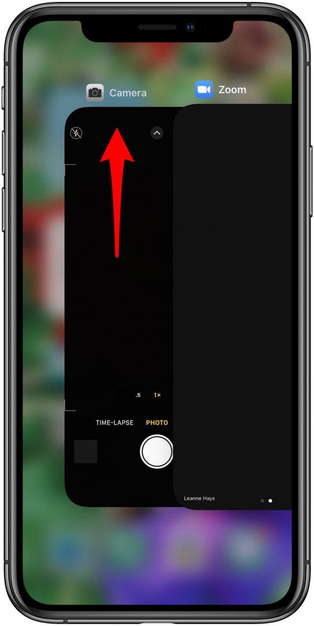 balayez vers le haut pour quitter les applications qui utilisent l'appareil photo