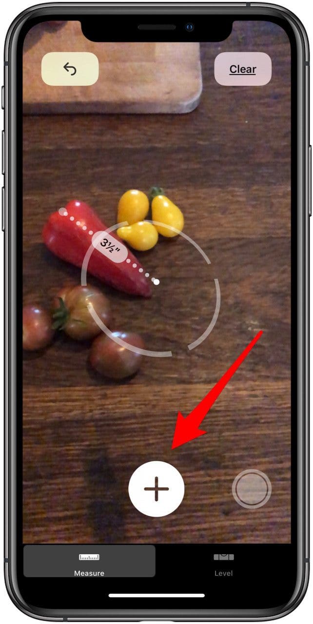 l'image montre que l'utilisateur appuie sur le signe plus pour terminer la mesure