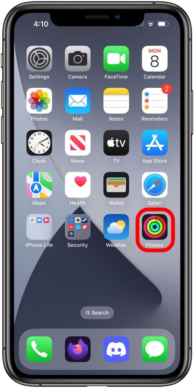 Écran d'accueil avec l'application Apple Fitness marquée.