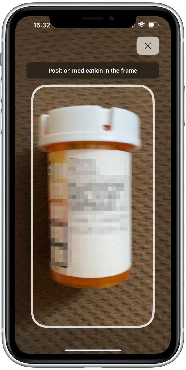 Positionnez votre caméra sur le médicament comme indiqué.  Il devrait le scanner très rapidement.