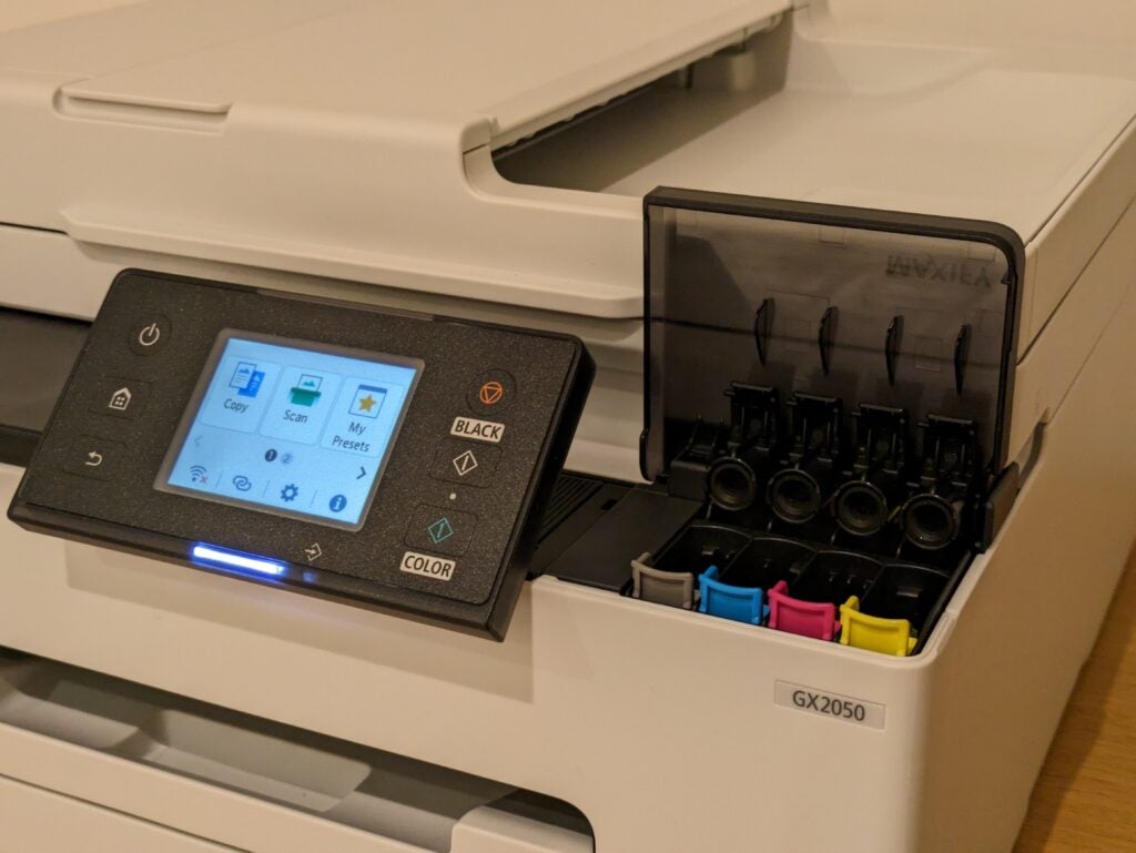 Couvercles des réservoirs d'encre ouverts à l'avant du MFP