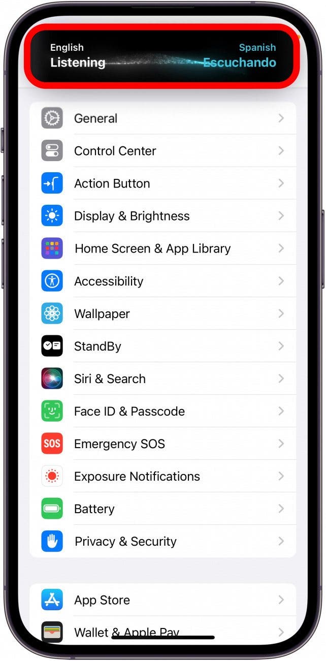 Paramètres de l'iPhone avec une fenêtre contextuelle de traduction ouverte dans l'îlot dynamique affichant l'anglais vers l'espagnol