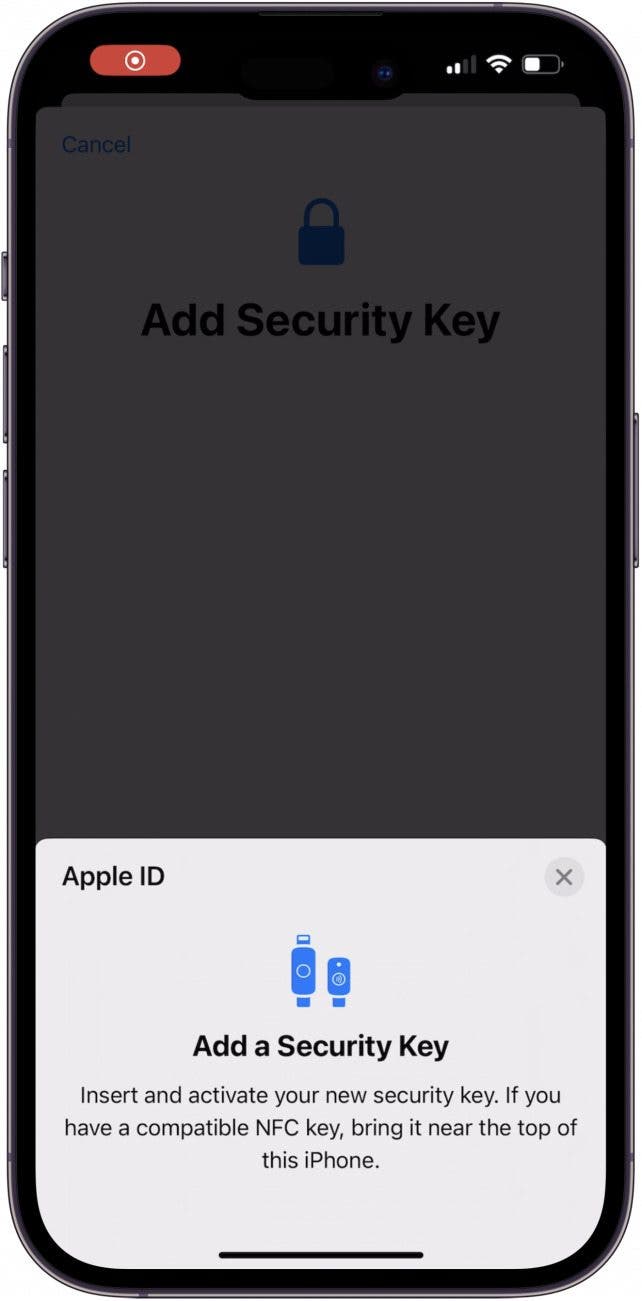 Insérez ou maintenez votre clé de sécurité à votre iPhone