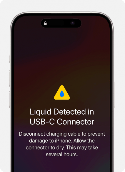 Une capture d'écran d'un écran iPhone qui est complètement noir à part le texte qui dit que Liquid a été détecté dans le port de chargement